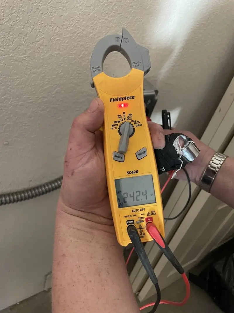 Voltage testing with clamp meter during Electrical Installation Services in Waterboro